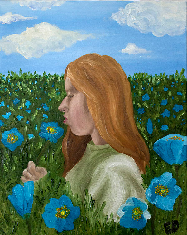 self portrait, red-head girl in a field of blue Himalayan poppies 